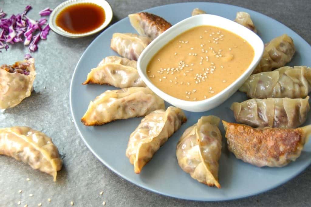 Vegan potstickers with sauce