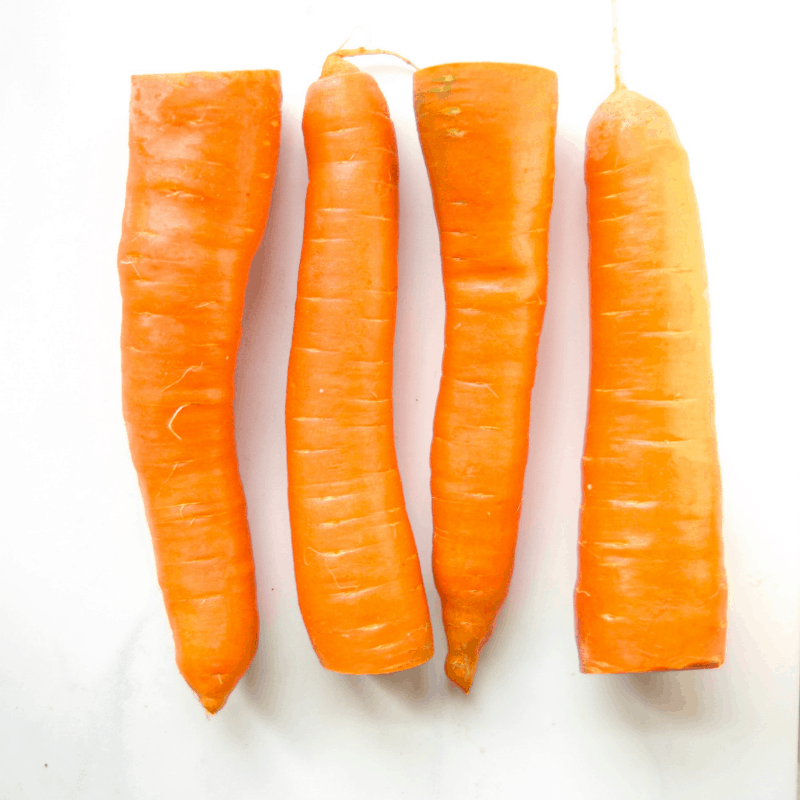 Fresh carrots with the greens removed.