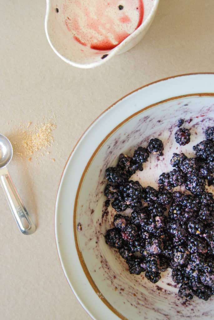 Blackberries in a bowl to make a vegan cobbler.
