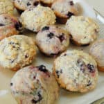 a tray full of vegan blackberry muffins