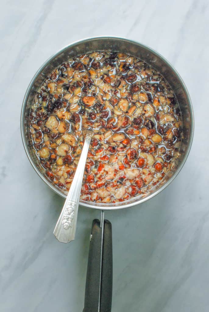 orgeat syrup steeping in a pot.