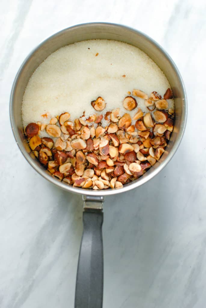 nuts and sugar in a pot, ready to make willamette transplant's orgeat recipe.