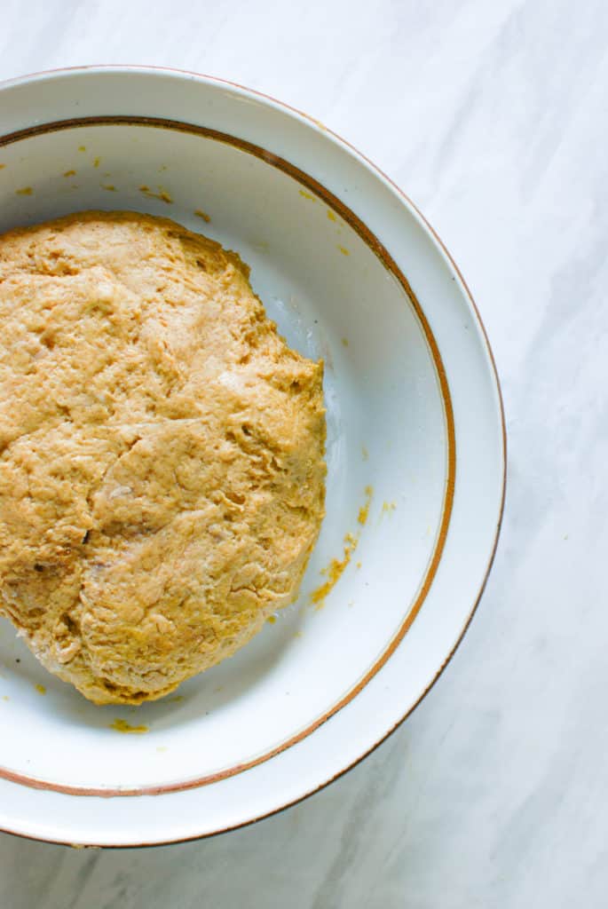 A bowl of pumpkin biscotti dough.