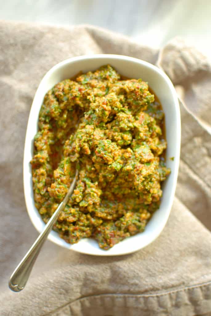 a bowl of vegan sundried tomato pesto