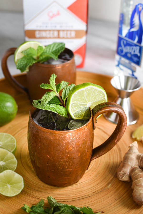 two tequila mules on a serving tray