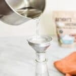 pouring xylitol syrup into a jar