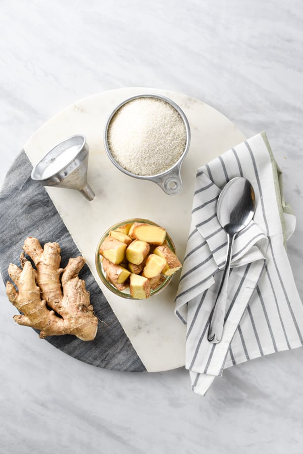 Ingredients for ginger syrup on a cutting board