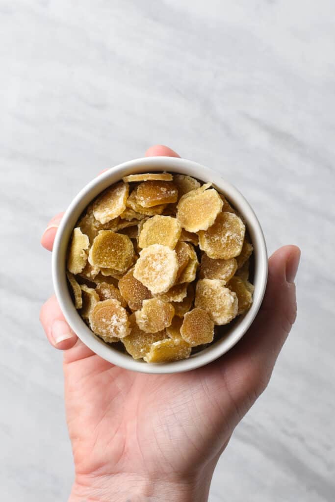 A bowl of candied ginger coins