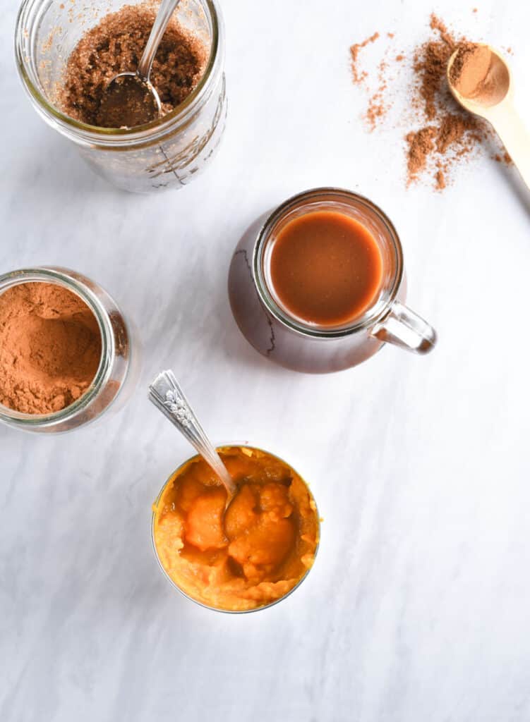 Ingredients to make pumpkin spice syrup on the counter.