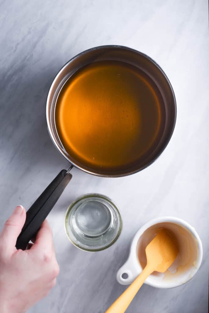 Honey and water in a small pot.