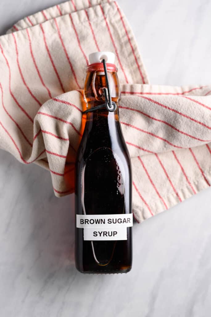 Brown sugar syrup for coffee in a glass jar.