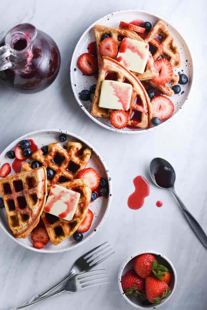 Raspberry syrup on breakfast waffles.