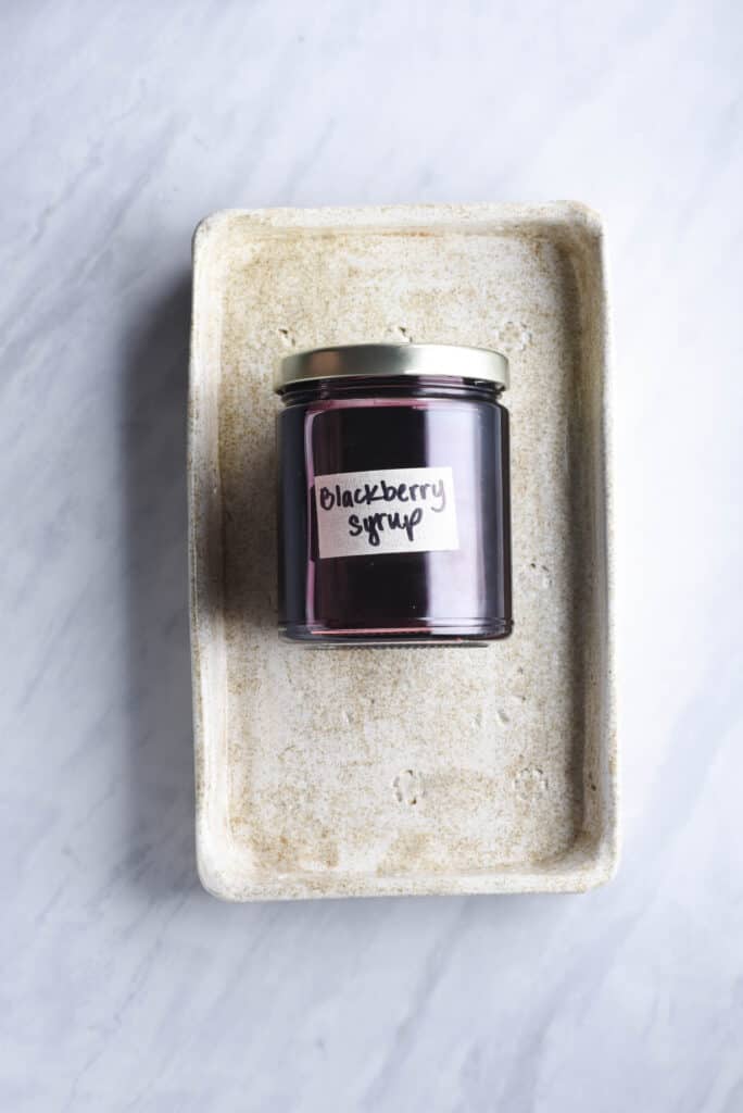 A jar of blackberry simple syrup