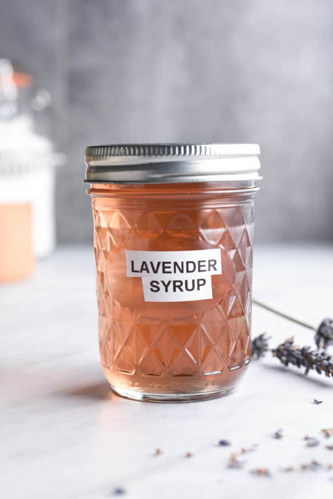 lavender simple syrup in a jar