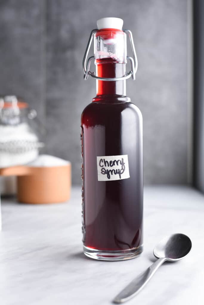 A close up shot of cherry simple syrup