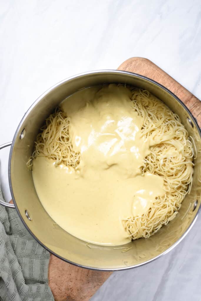 Vegan bechamel sauce over pasta