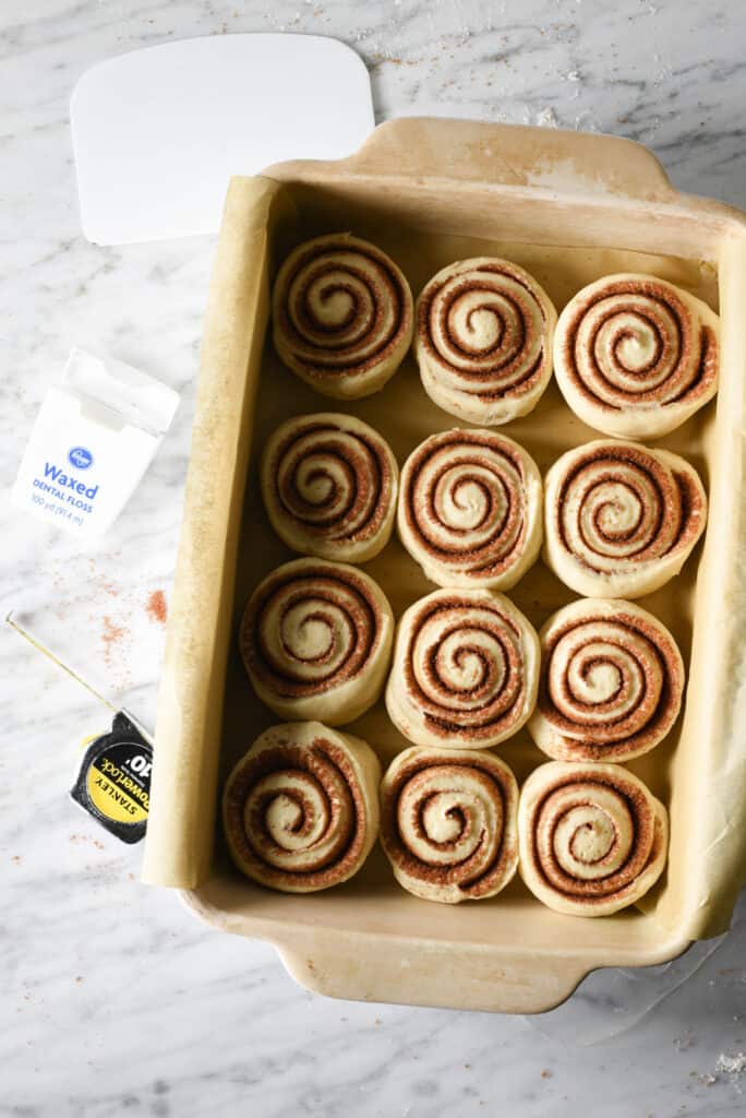 A pan of vegan cinnamon rolls after proofing